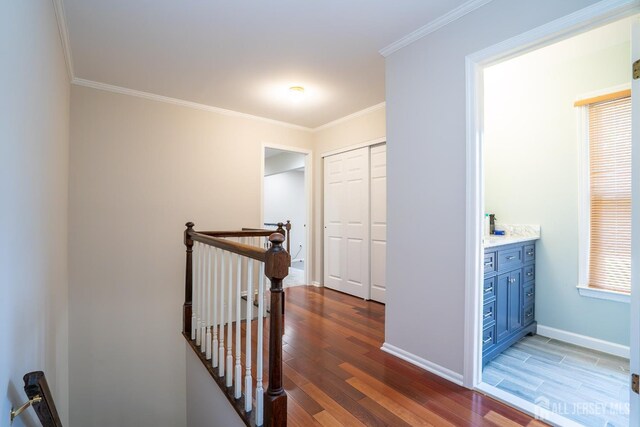 55 Cambridge Way, West Windsor, NJ 08550 - corridor with an upstairs landing, wood finished floors, ornamental molding, and baseboards