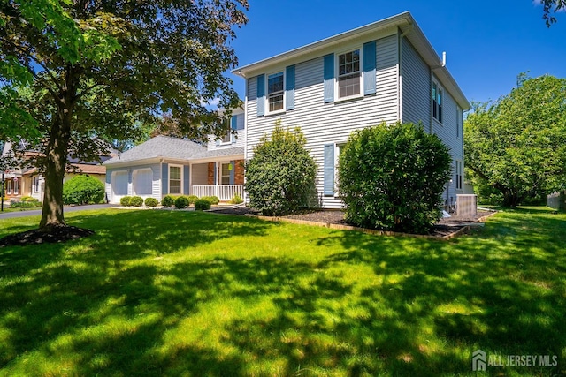 55 Cambridge Way, West Windsor, NJ 08550 - view of front of home with an attached garage and a front lawn