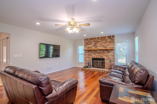 55 Cambridge Way, West Windsor, NJ 08550 - living room featuring healthy amount of natural light, wood finished floors, ceiling fan, recessed lighting, and a brick fireplace