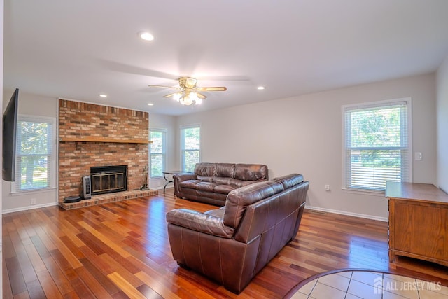 55 Cambridge Way, West Windsor, NJ 08550 - living room with a ceiling fan, wood finished floors, baseboards, recessed lighting, and a brick fireplace