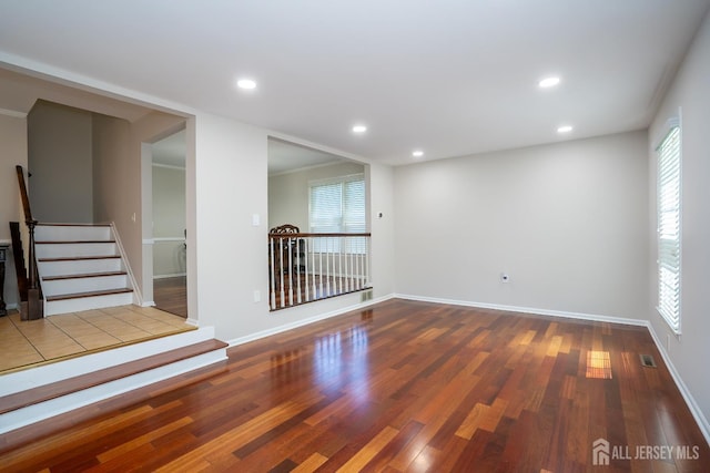 55 Cambridge Way, West Windsor, NJ 08550 - spare room featuring wood finished floors, baseboards, recessed lighting, plenty of natural light, and stairway