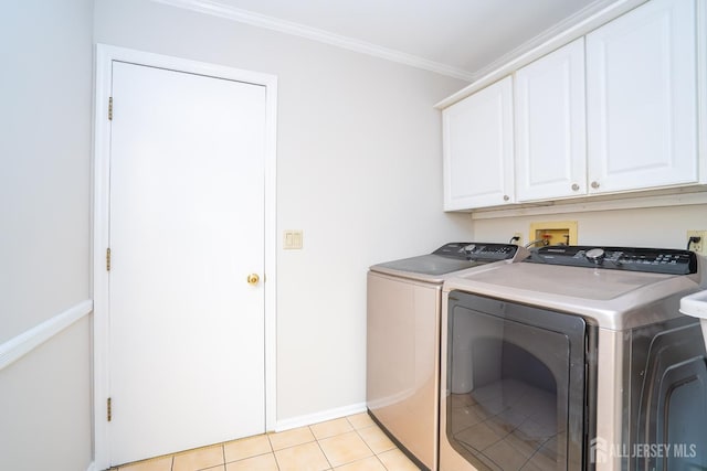 55 Cambridge Way, West Windsor, NJ 08550 - laundry room with washer and clothes dryer, cabinet space, ornamental molding, baseboards, and light tile patterned floors