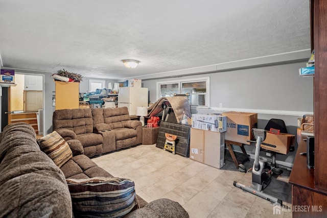 living room featuring a textured ceiling