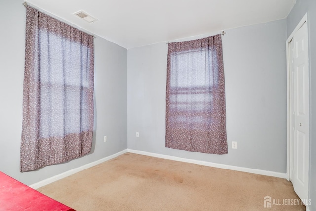 128 Remsen Ave Unit A, New Brunswick, NJ 08901 - unfurnished bedroom featuring carpet floors, baseboards, and a closet