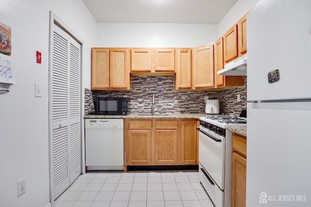 128 Remsen Ave Unit A, New Brunswick, NJ 08901 - kitchen featuring white appliances, under cabinet range hood, a sink, and backsplash