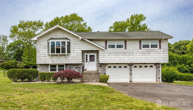 23 Little Brook Ln, Monroe, NJ 08831 - raised ranch featuring asphalt driveway, an attached garage, a front yard, and stone siding