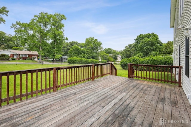 23 Little Brook Ln, Monroe, NJ 08831 - wooden deck with a yard and view of wooded area