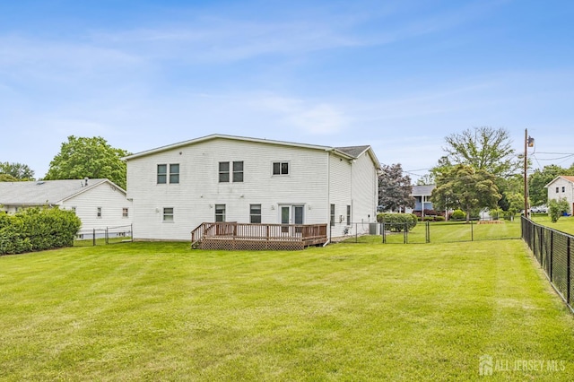 23 Little Brook Ln, Monroe, NJ 08831 - rear view of property with a wooden deck and central AC