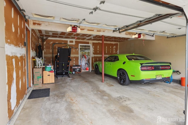 23 Little Brook Ln, Monroe, NJ 08831 - garage with a garage door opener