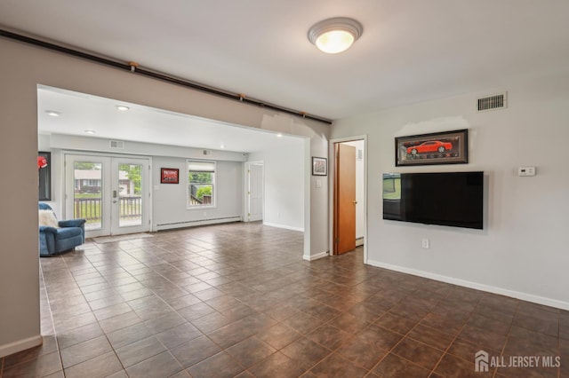 23 Little Brook Ln, Monroe, NJ 08831 - unfurnished living room with a baseboard radiator, french doors, baseboards, dark tile patterned flooring, and recessed lighting