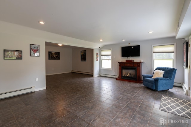 23 Little Brook Ln, Monroe, NJ 08831 - unfurnished living room featuring a baseboard heating unit, a baseboard radiator, recessed lighting, baseboards, and a glass covered fireplace