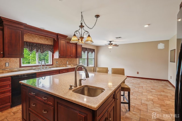 23 Little Brook Ln, Monroe, NJ 08831 - kitchen featuring a sink, black dishwasher, and backsplash
