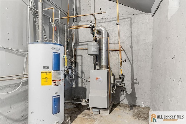utility room featuring electric water heater and a heating unit