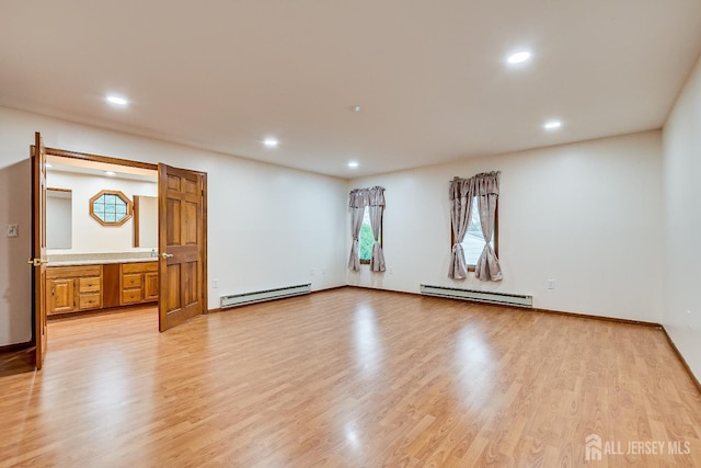 86 Bunker Hill Rd, Lawrence, NJ 08648 - unfurnished living room with a baseboard radiator, recessed lighting, and light wood-style floors