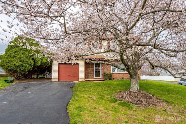 86 Bunker Hill Rd, Lawrence, NJ 08648 - obstructed view of property featuring driveway, a garage, and brick siding