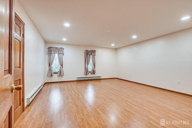 86 Bunker Hill Rd, Lawrence, NJ 08648 - spare room with baseboard heating, light wood-style floors, and recessed lighting