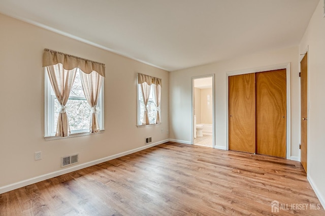 86 Bunker Hill Rd, Lawrence, NJ 08648 - unfurnished bedroom with wood finished floors, connected bathroom, and a closet