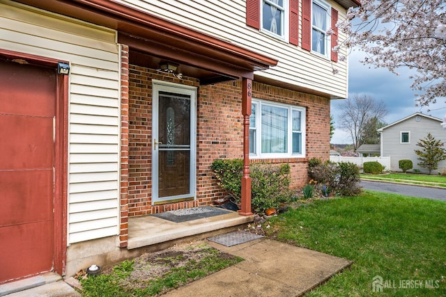 86 Bunker Hill Rd, Lawrence, NJ 08648 - property entrance featuring brick siding and a yard