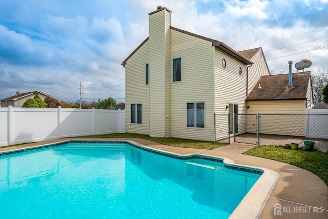 86 Bunker Hill Rd, Lawrence, NJ 08648 - view of swimming pool with a fenced backyard