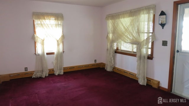 view of carpeted spare room