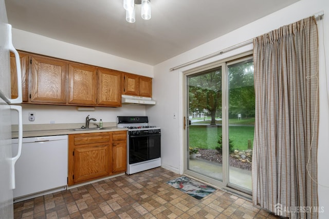 101 Mandon Ct Unit 4, South Brunswick, NJ 08540 - kitchen with white appliances, a sink, light countertops, under cabinet range hood, and brick patterned flooring