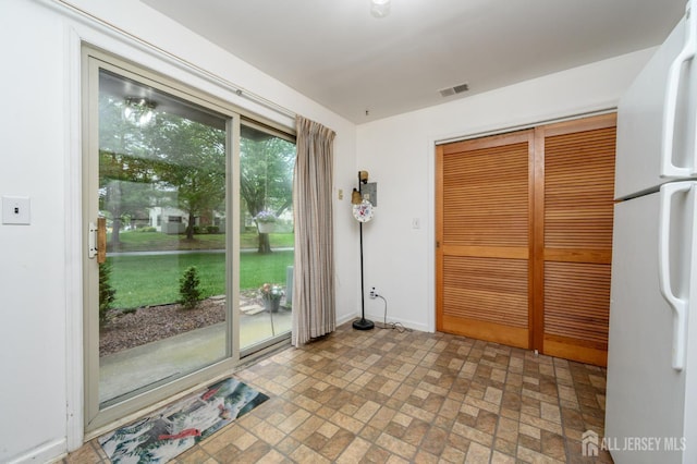 101 Mandon Ct Unit 4, South Brunswick, NJ 08540 - entryway featuring brick patterned floors and baseboards