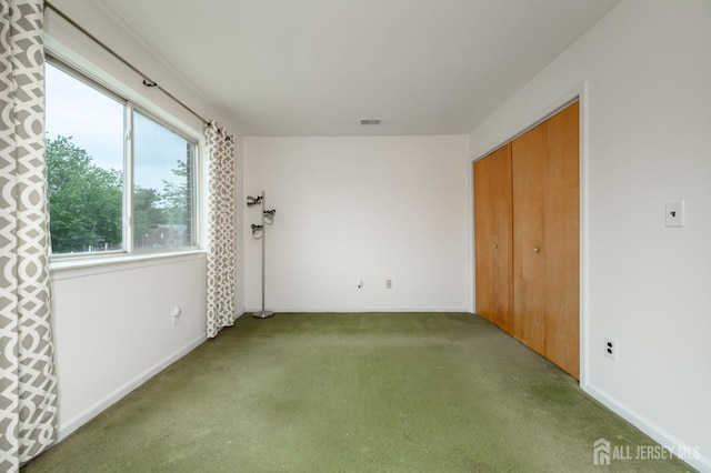 101 Mandon Ct Unit 4, South Brunswick, NJ 08540 - unfurnished bedroom with carpet flooring, baseboards, and a closet
