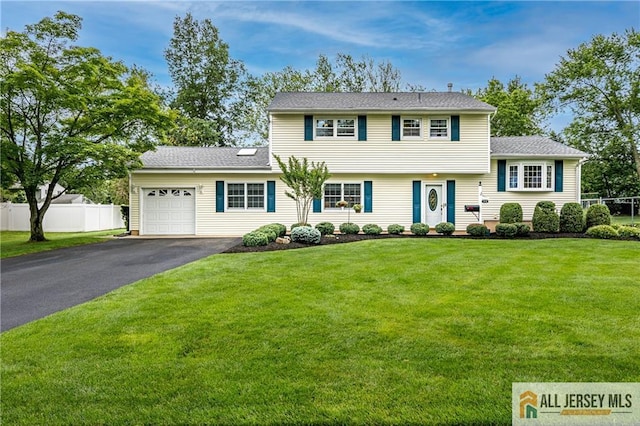 13 Steven Rd, South Brunswick, NJ 08824 - view of front facade featuring a garage and driveway