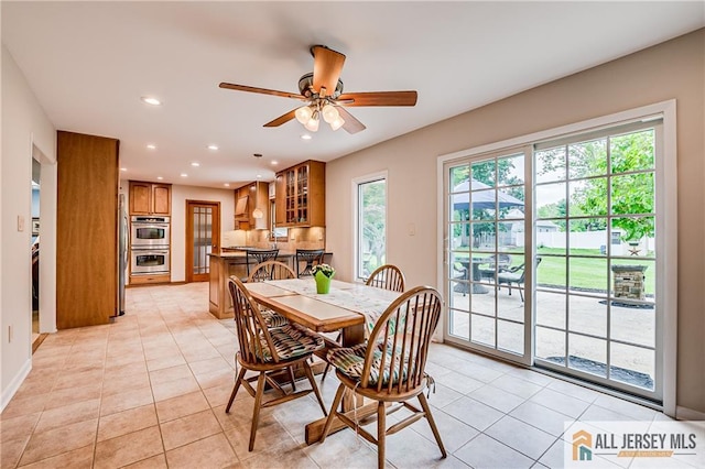13 Steven Rd, South Brunswick, NJ 08824 - dining area featuring recessed lighting, light tile patterned floors, a ceiling fan, and baseboards
