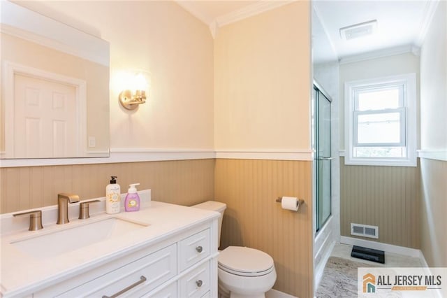 1516 N Indian Pl, North Brunswick, NJ 08902 - bathroom with a wainscoted wall, crown molding, vanity, and enclosed tub / shower combo