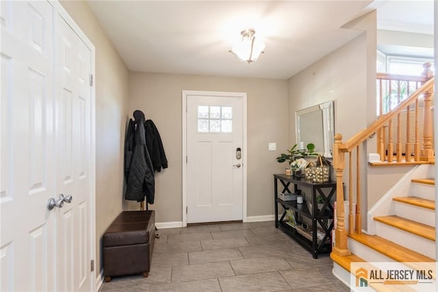 1516 N Indian Pl, North Brunswick, NJ 08902 - foyer featuring stairs and baseboards