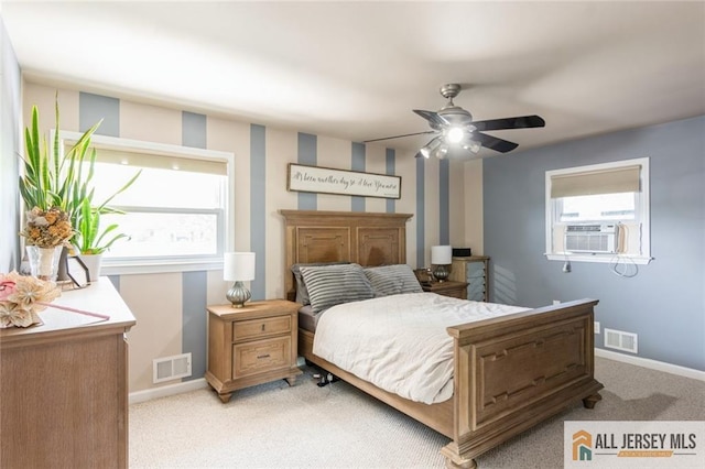 1516 N Indian Pl, North Brunswick, NJ 08902 - bedroom with light carpet, cooling unit, and ceiling fan