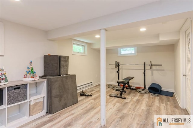 1516 N Indian Pl, North Brunswick, NJ 08902 - workout area featuring baseboard heating, wood finished floors, plenty of natural light, and recessed lighting