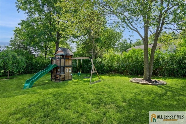 1516 N Indian Pl, North Brunswick, NJ 08902 - view of jungle gym with a yard and view of scattered trees