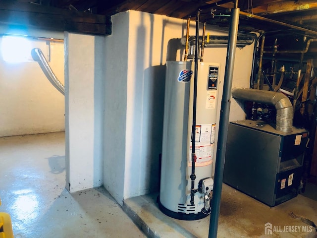 utility room featuring water heater