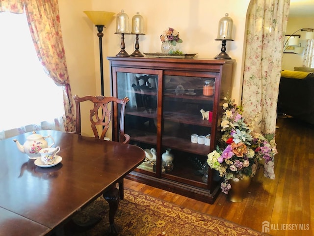 dining area with hardwood / wood-style flooring