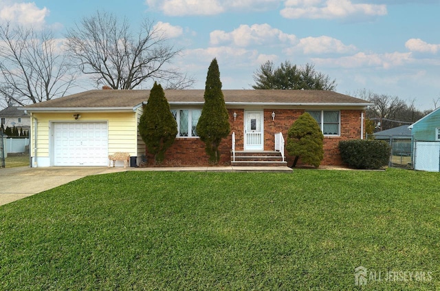 single story home with brick siding, concrete driveway, an attached garage, fence, and a front lawn