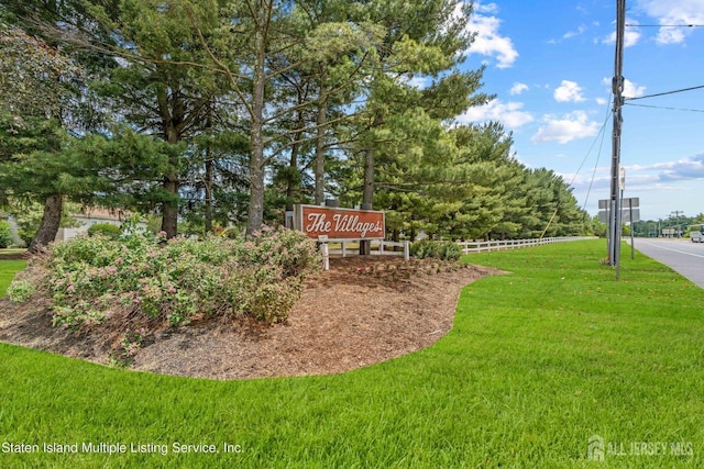 164 Cours De Clemenceau Unit E, Freehold, NJ 07728 - community sign with a yard