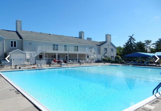 164 Cours De Clemenceau Unit E, Freehold, NJ 07728 - community pool featuring stairway