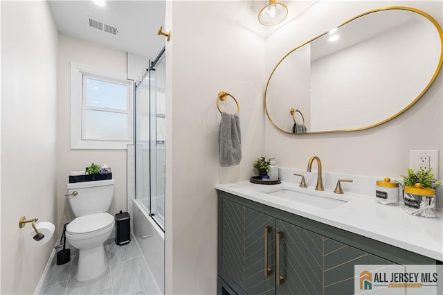 8 N Rhoda St, Monroe, NJ 08831 - full bath featuring vanity, toilet, enclosed tub / shower combo, baseboards, and marble look tiles