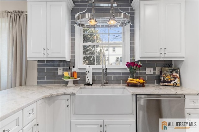 8 N Rhoda St, Monroe, NJ 08831 - kitchen featuring dishwasher, a sink, decorative backsplash, and white cabinets