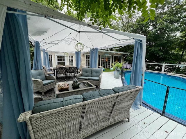 520 Albermarle St, Rahway, NJ 07065 - wooden terrace featuring an outdoor living space and an outdoor pool