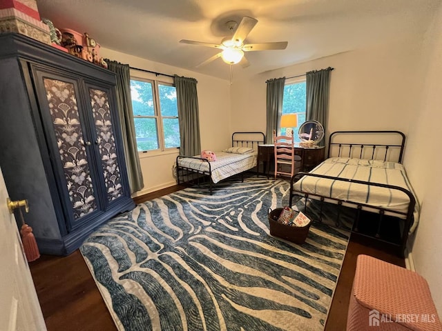 520 Albermarle St, Rahway, NJ 07065 - bedroom with multiple windows, wood finished floors, and ceiling fan