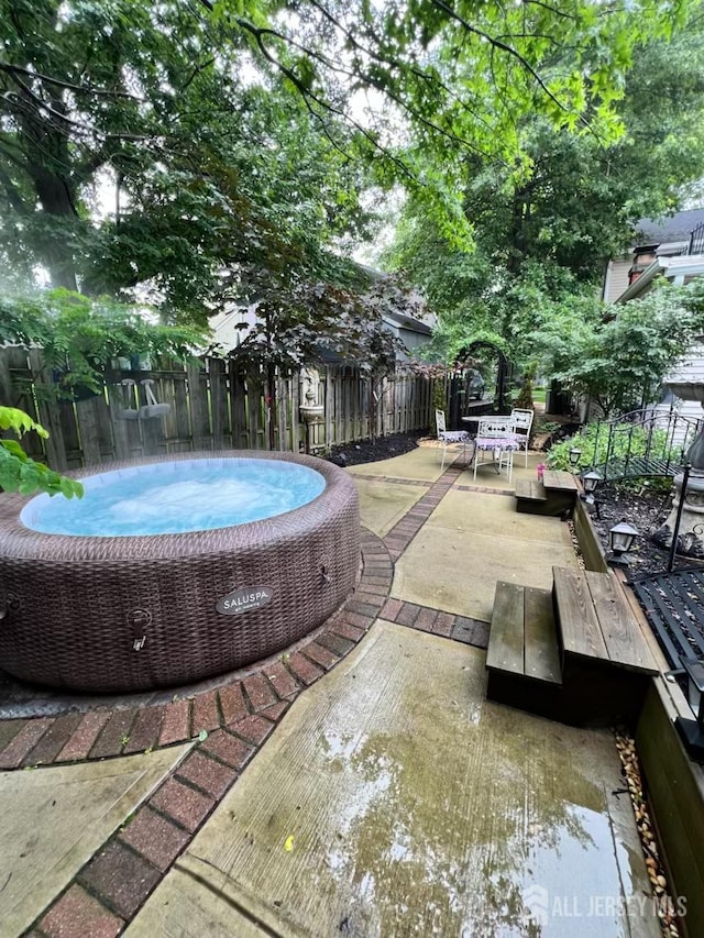 520 Albermarle St, Rahway, NJ 07065 - view of swimming pool with outdoor dining area, a fenced backyard, an outdoor hot tub, and a patio area