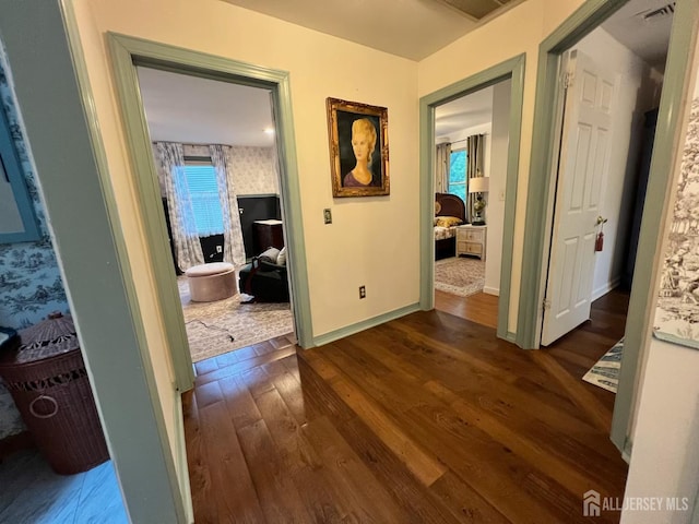 520 Albermarle St, Rahway, NJ 07065 - corridor featuring dark wood-type flooring and baseboards
