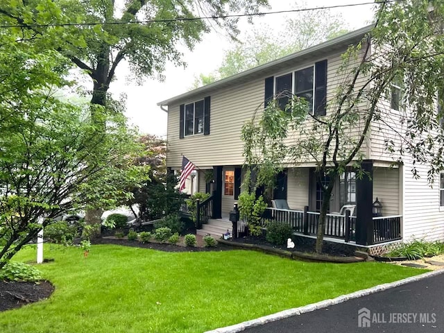 520 Albermarle St, Rahway, NJ 07065 - view of front of home with a front lawn and a porch
