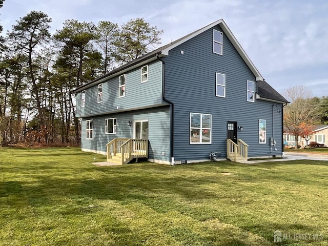 1032 3rd Ave, Manchester, NJ 08757 - back of property featuring entry steps and a yard