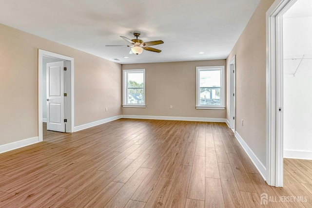 1032 3rd Ave, Manchester, NJ 08757 - empty room with a ceiling fan and light wood-type flooring