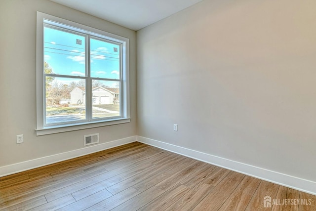 1032 3rd Ave, Manchester, NJ 08757 - unfurnished room with baseboards and light wood finished floors