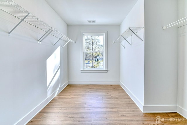 1032 3rd Ave, Manchester, NJ 08757 - spacious closet featuring light wood finished floors